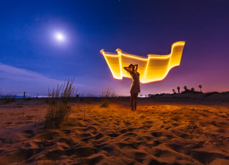 Morocco-_0079_silhouette-of-woman-with-colored-lights-2023-11-27-05-09-54-utc